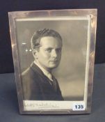 A photograph of a Gentleman signed Dorothy Wilding in silver rectangular photo frame, 25cm x 18cm