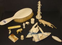 Ivory back clothes brush, various carved bone/ivory animals and objects, carved bone sailing boats