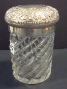 A silver wrythen glass jar, with ornate silver cover and inscription referring to the `Disbandment
