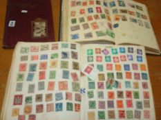Three albums of various stamps and some cigarette cards