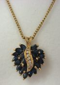 9ct sapphire and diamond heart shaped pendant on fine chain
