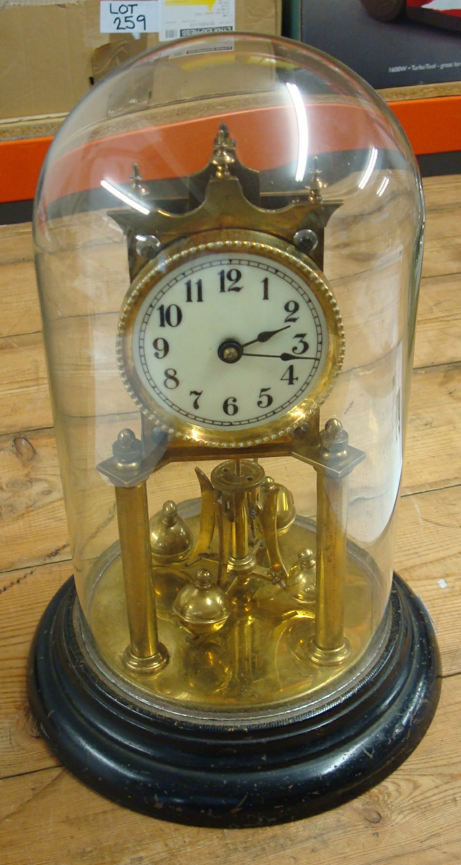 German brass 300 day Anniversary clock under dome