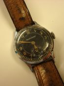 Small Gents Jaeger Le Coultre wristwatch with black dial, sub second dial, arabic numerals, the back