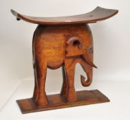 Carved hardwood `elephant` signed stool, 57cm high