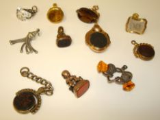 Collection of various swivel fobs including 9ct and 10ct gold and two other items (11)