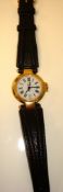 Ladies Dunhill silver gilt wrist watch with date aperture