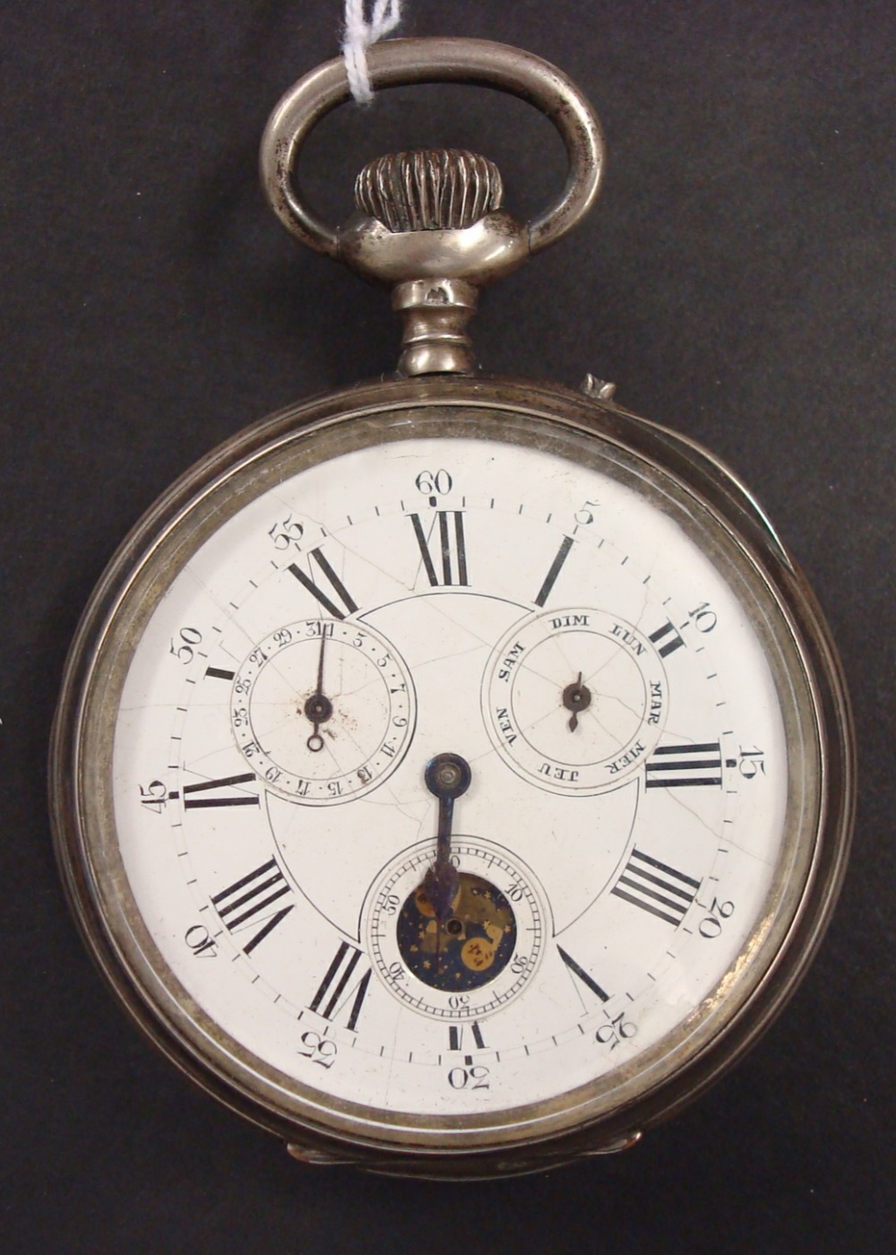 Large chronograph open face and keyless pocket watch with moon phase aperture, the inside plate