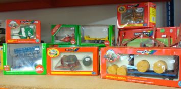 Collection of Britain`s die cast 1/32 scale models of farmyard machinery including bale wrapper,