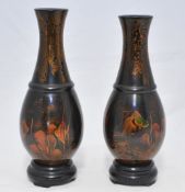 Pair of modern lacquered baluster shaped vases decorated with fish, 33 cm high