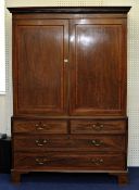 A George III mahogany and inlaid Linen Press fitted with two long and two short drawers, 133cm