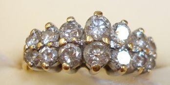 A fourteen stone diamond ring set in yellow gold, size K