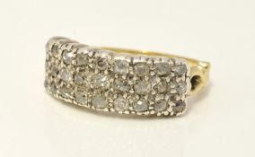 A diamond cluster ring set in yellow gold, size N