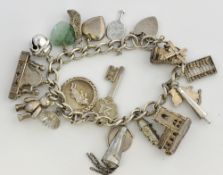 Silver charm bracelet, 62g
