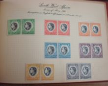 An album of part Coronation stamps, May 1937 t/w miniature stamp album including George V and page