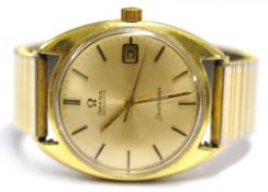 A Gents Omega yellow metal wrist watch with date, circa 1960