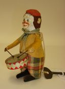 German Schuco tinplate and clockwork drummer toy with key, 12cm