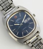 Steel Gents Omega Megaquartz day date wrist watch with blue dial