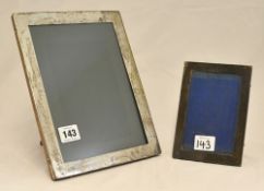 Two silver rectangular photo frames, the largest 24cm x 19cm