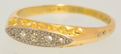 An 18ct gold and five stone diamond ring, size P