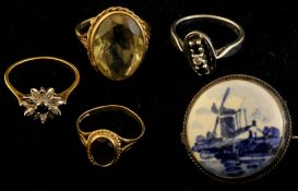 Four various gold dress rings including sapphire and diamond also a Delft brooch