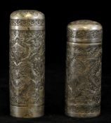 Two Middle Eastern white metal pepper pots, tallest 9cm