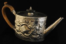 George III silver teapot with embossed flower decoration circa 1784, makers mark A.M. approx 447g