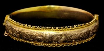 Early 20th century 9ct gold bangle with engraved decoration with original case from a Plymouth