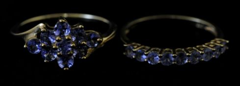 Two 9ct yellow gold rings set with Tanzanite, sizes P, & O