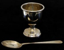 A silver egg and spoon set with original case