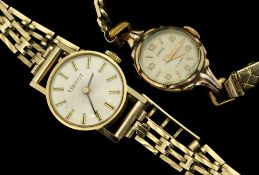 9ct gold ladies Tissot wristwatch with original box and guarantee dated 1979, together with a gold