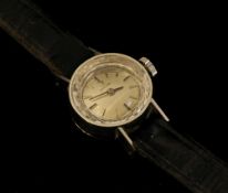 A ladies Omega circular small wrist watch in 18ct white gold
