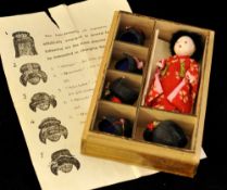 Small Japanese doll with five changeable wigs with original instructions pamphlet and wood box 10cm