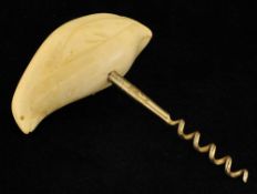 An Inuit carving of a cork screw in the form of a seal, 13cm (Please visit our website for