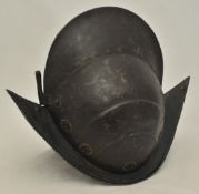 An antique Spanish Morion helmet, no lining, 30cm tall