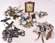 Large quantity of general wrist watches mainly modern approx 60, also a quartz table clock