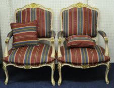 Pair 20th century French design open arm chairs