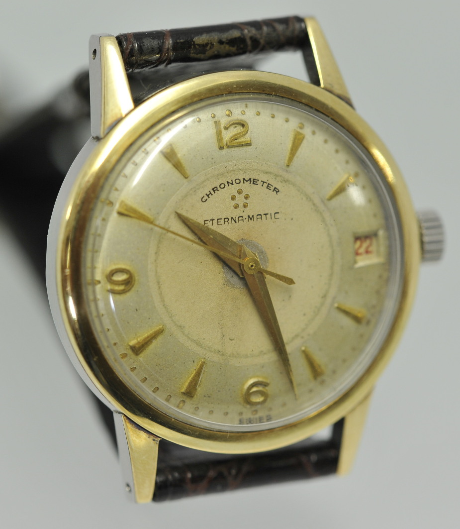 Eternamatic wrist watch, automatic date, unmarked gold to bezel and lugs