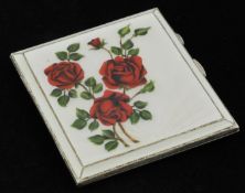 Silver and enamel square cigarette case decorated with roses