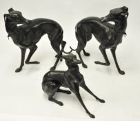 Three Bronze Whippet Statues, the largest dog approx 56cm high.