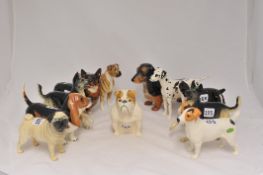 Three Beswick dogs including Basset Hound 2045A, Dachshund 361 and Corgi 1299A (3),Two Beswick dogs,