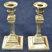 Pair of silver Adam style candlesticks, 17cm high
