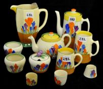 Clarice Cliff Crocus design china wares, including coffee pot, tea pot, jugs etc (11), largest 18cm