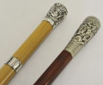 A Chinese silver top Malacca cane walking stick and another similar (2)  (one hallmarked), 85cm &