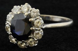 Fine 18ct diamond and sapphire cluster ring, size U
