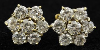 Pair of 18ct diamond cluster earrings of flower design approx 2.80ct