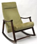 A Danish teak framed and upholstered rocking chair