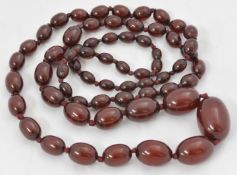 A row of red amber bead, approx 72g