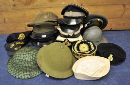 A collection of various Military and other Hats including Army Catering Corp, HMS Alacrity etc (11)