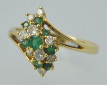 18ct emerald and diamond cluster ring, size M