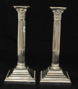 Pair silver plated candlesticks, Corinthian column design on stepped bases, 30cm